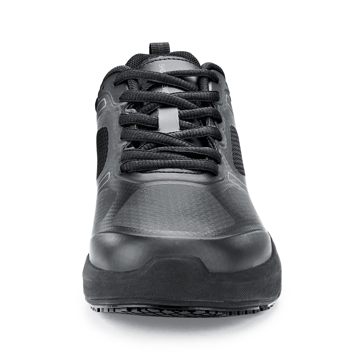 The Revolution II Black from Shoes For Crews are slip-resistant trainers designed to provide comfort, seen from the front.
