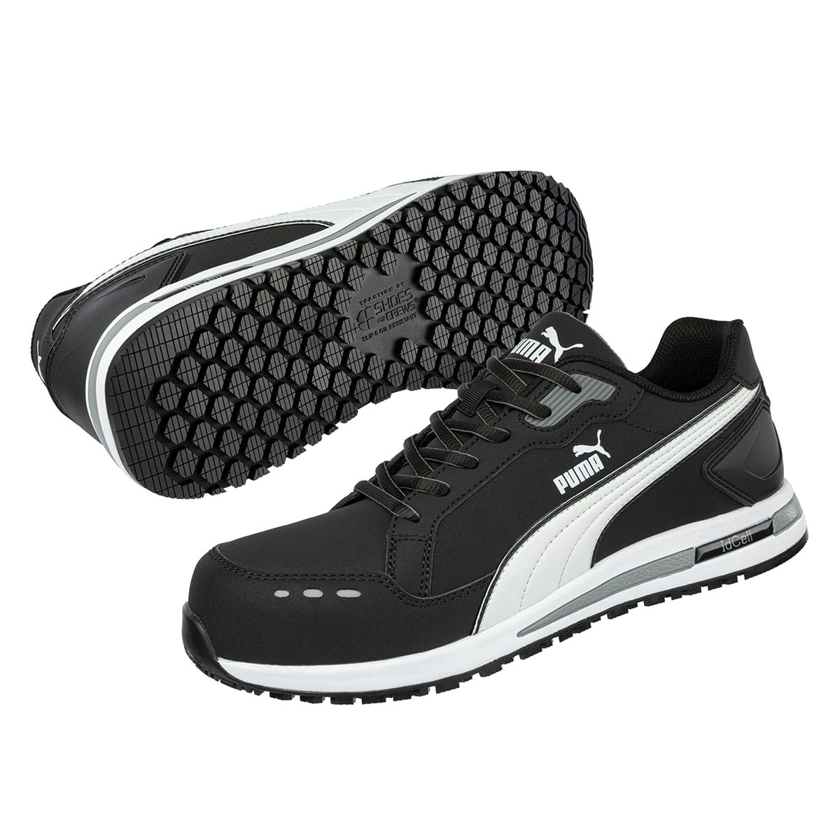 Black slip resistant shoe with composite toe cap (200 joules), sole view and side view.