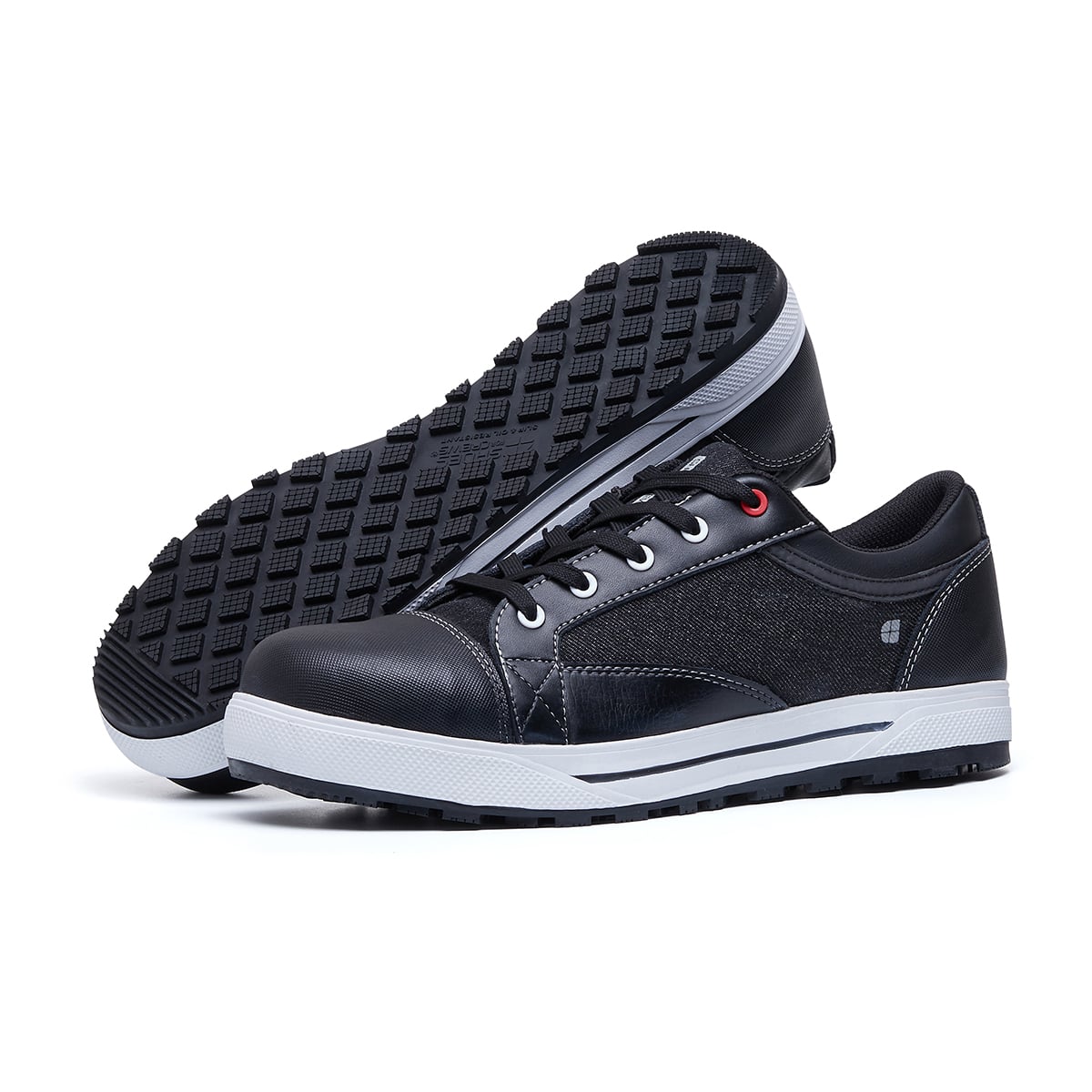 The Fergus Denim from Shoes For Crews is an slip-resistant safety shoe with a waterproof leather upper and a nanocomposite toe cap (200 joules), pair seen from the left side and the sole.