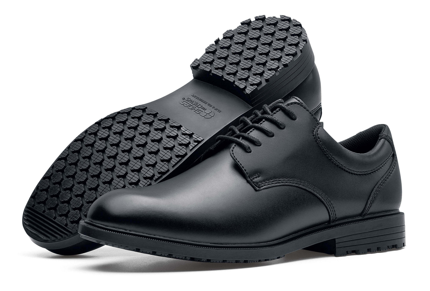 The Shoes for Crews Cambridge III is a slip-resistant leather dress shoe, with removable cushioned insoles and a padded comfort collar, pair seen from the left side and below.