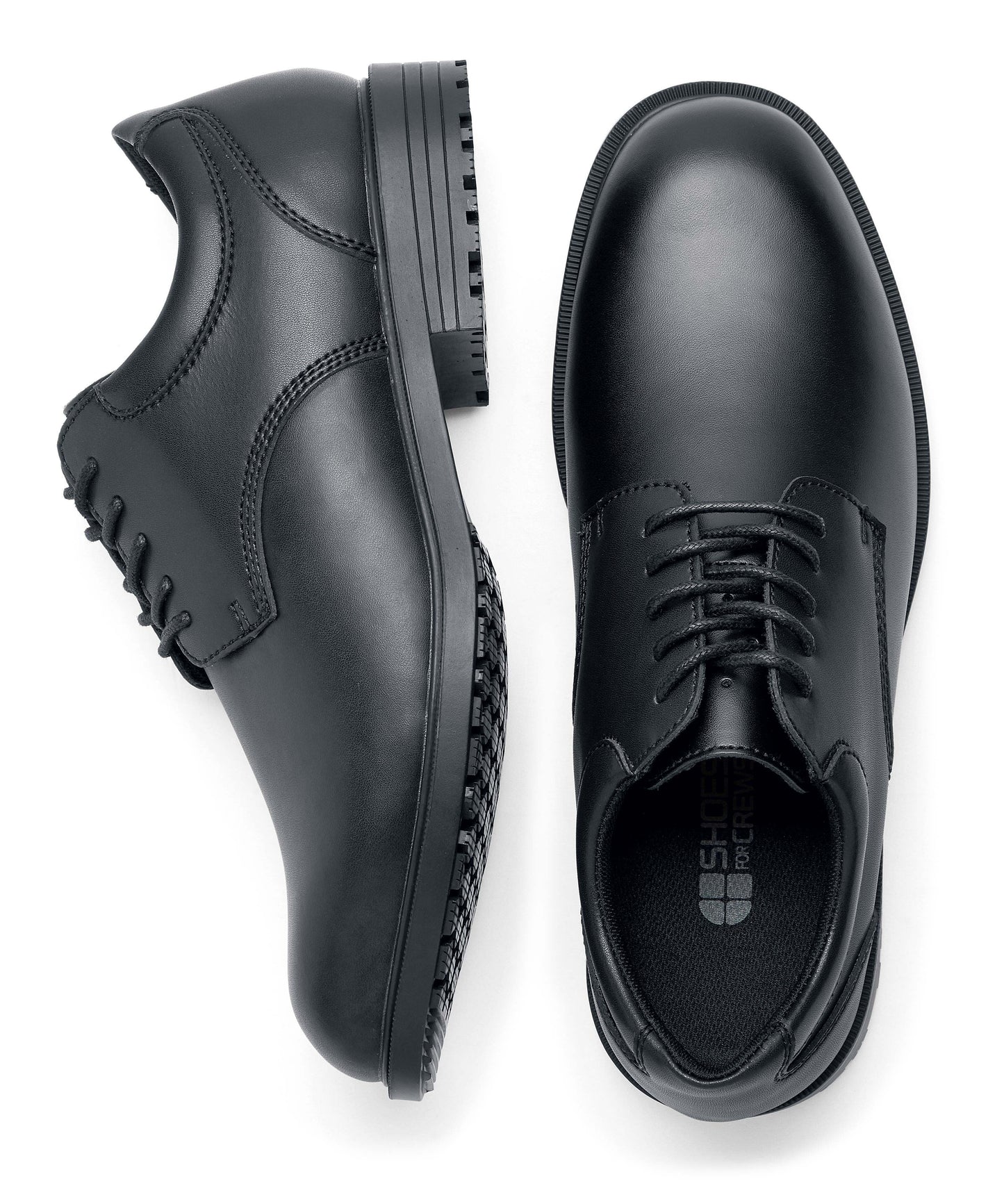 The Shoes for Crews Cambridge III is a slip-resistant leather dress shoe, with removable cushioned insoles and a padded comfort collar, pair seen from above and from the side.