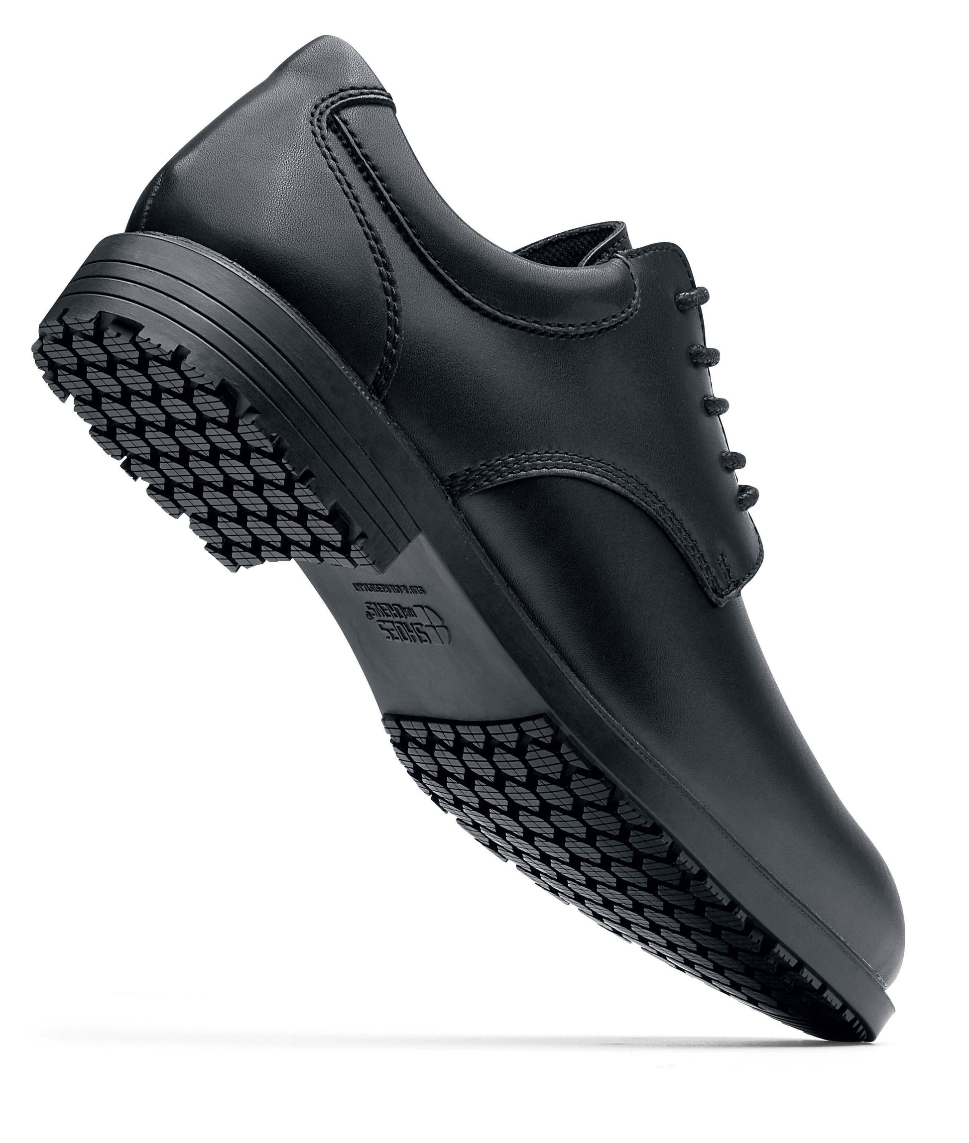 The Shoes for Crews Cambridge III is a slip-resistant leather dress shoe, with removable cushioned insoles and a padded comfort collar, seen from the right side with the heel highlighted.