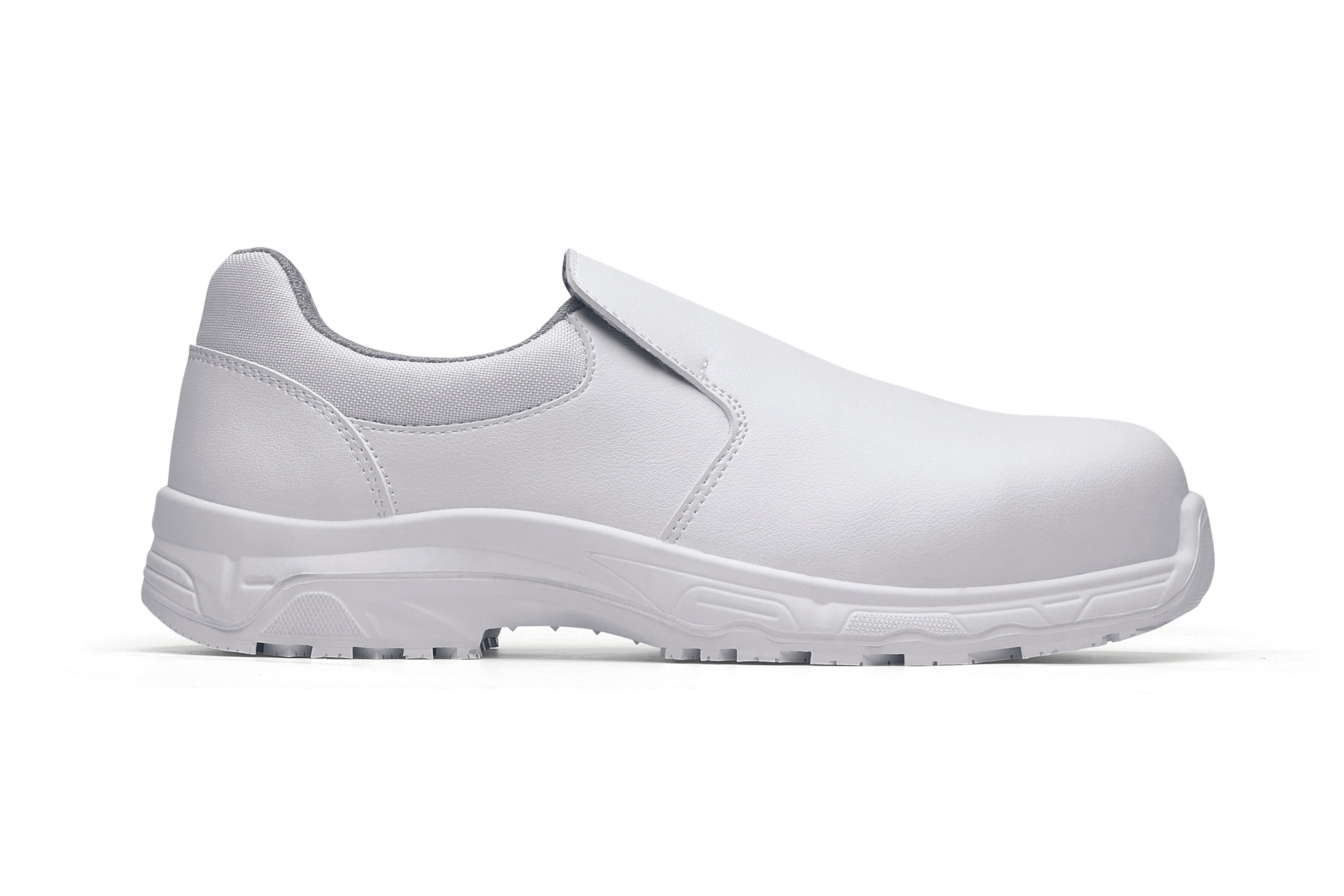 The Catania White  from Shoes For Crews, made in Italy, is a slip-resistant shoe with a composite safety toe cap and a puncture-resistant midsole, seen from the right.