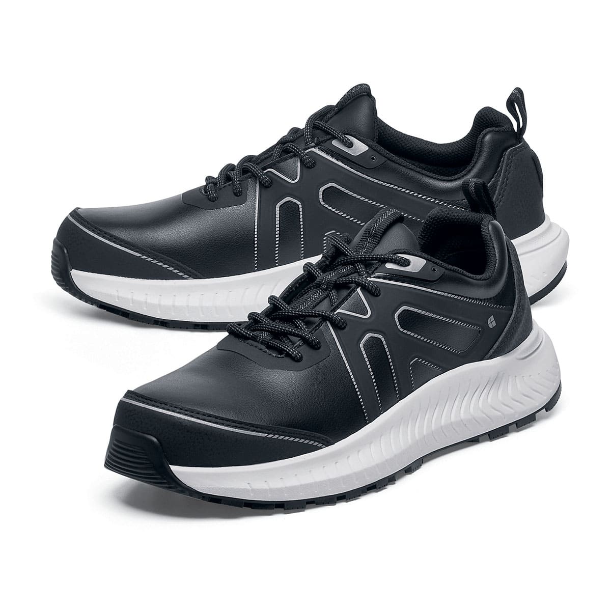 The Colly Soft Toe from Shoes For Crews are slip-resistant shoes that offer superior TripGuard technology, a water-resistant upper and arch support,  pair seen from the left side, emphasised on the tip of the left shoe.