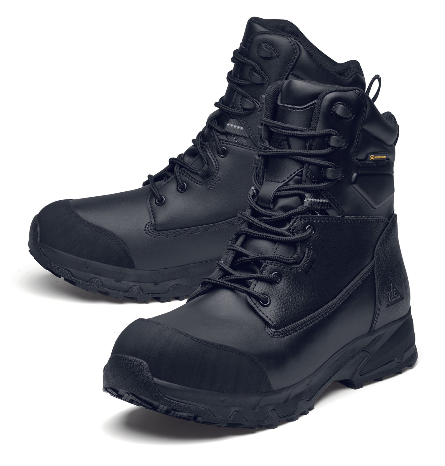 The Delvin from Shoes For Crews, the ultimate footwear for extreme conditions, pair seen from the left side, emphasised on the tip of the left shoe.
