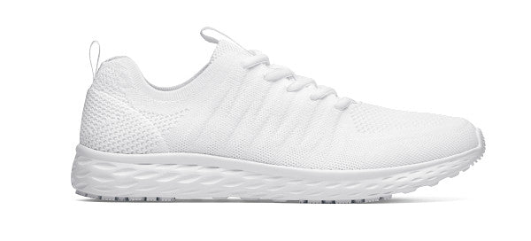 The Everlight Ce Womens White from Shoes For Crews are slip-resistant trainers with TripGuard technology, removable cushioned insoles and are also breathable, seen from the right.