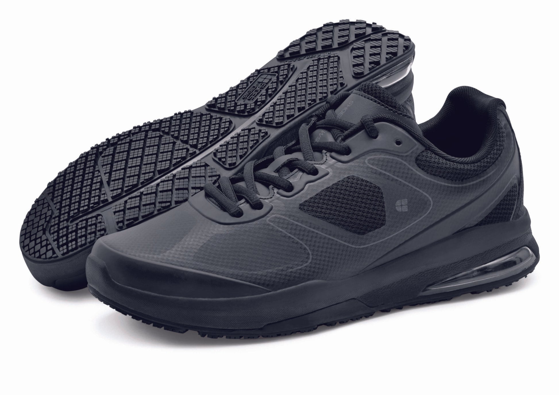 The Evolution II Black from Shoes For Crews are slip-resistant and water-resistant trainers, seen from the right side and the sole.