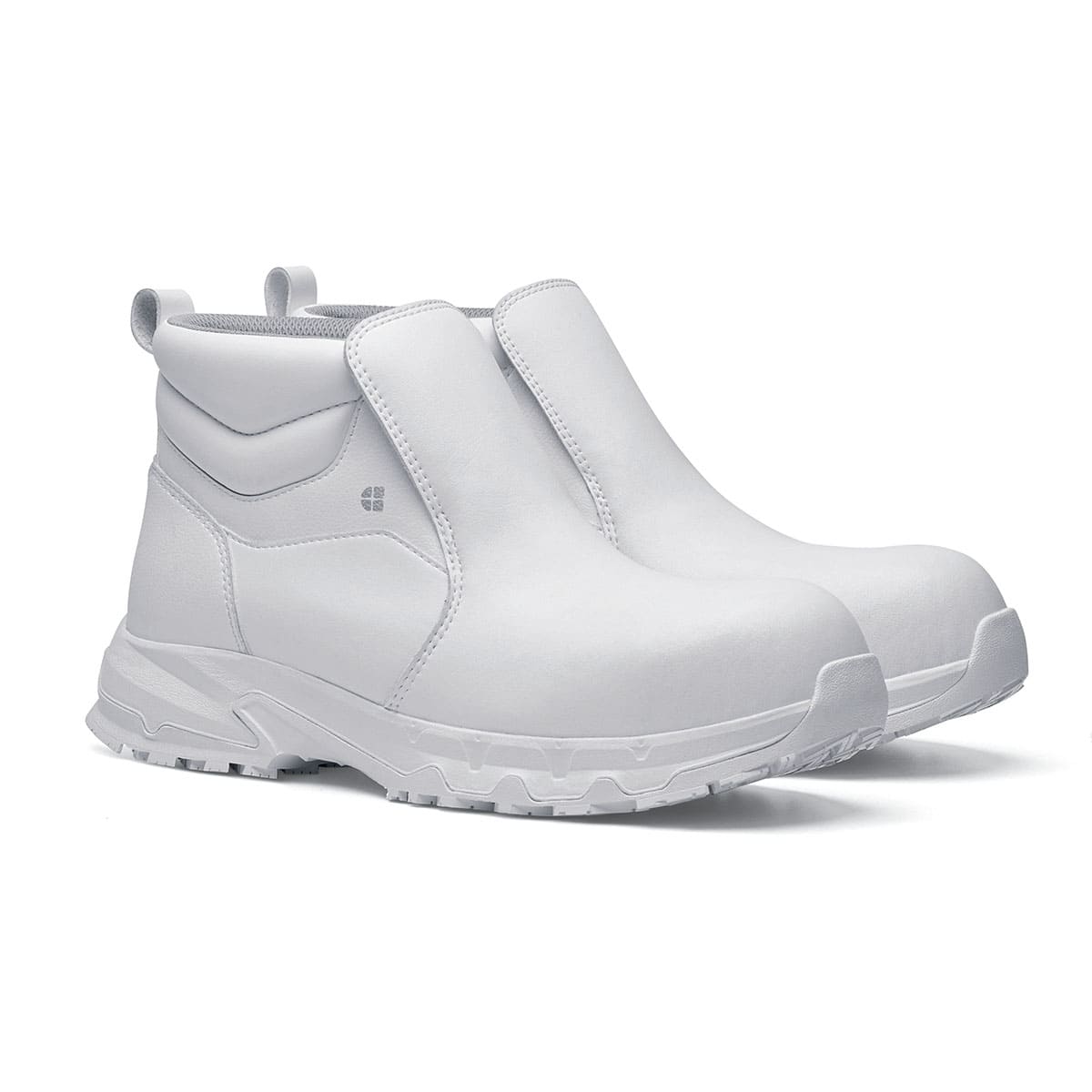 The Inny from Shoes For Crews is a safety shoe with a slip-resistant, clog-resistant upper sole and our advanced TripGuard technology, pair seen in profile on the right.