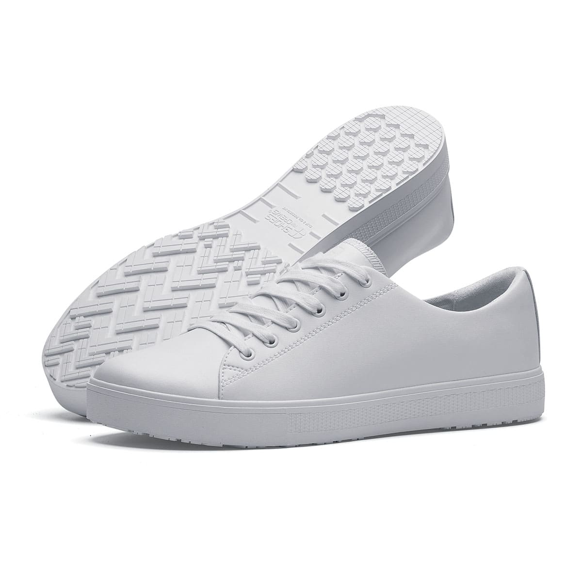 The Old School Low-Rider White from Shoes For Crews is a slip resistant lace-up designed to provide comfort throughout the day, pair seen from the left side and the sole.