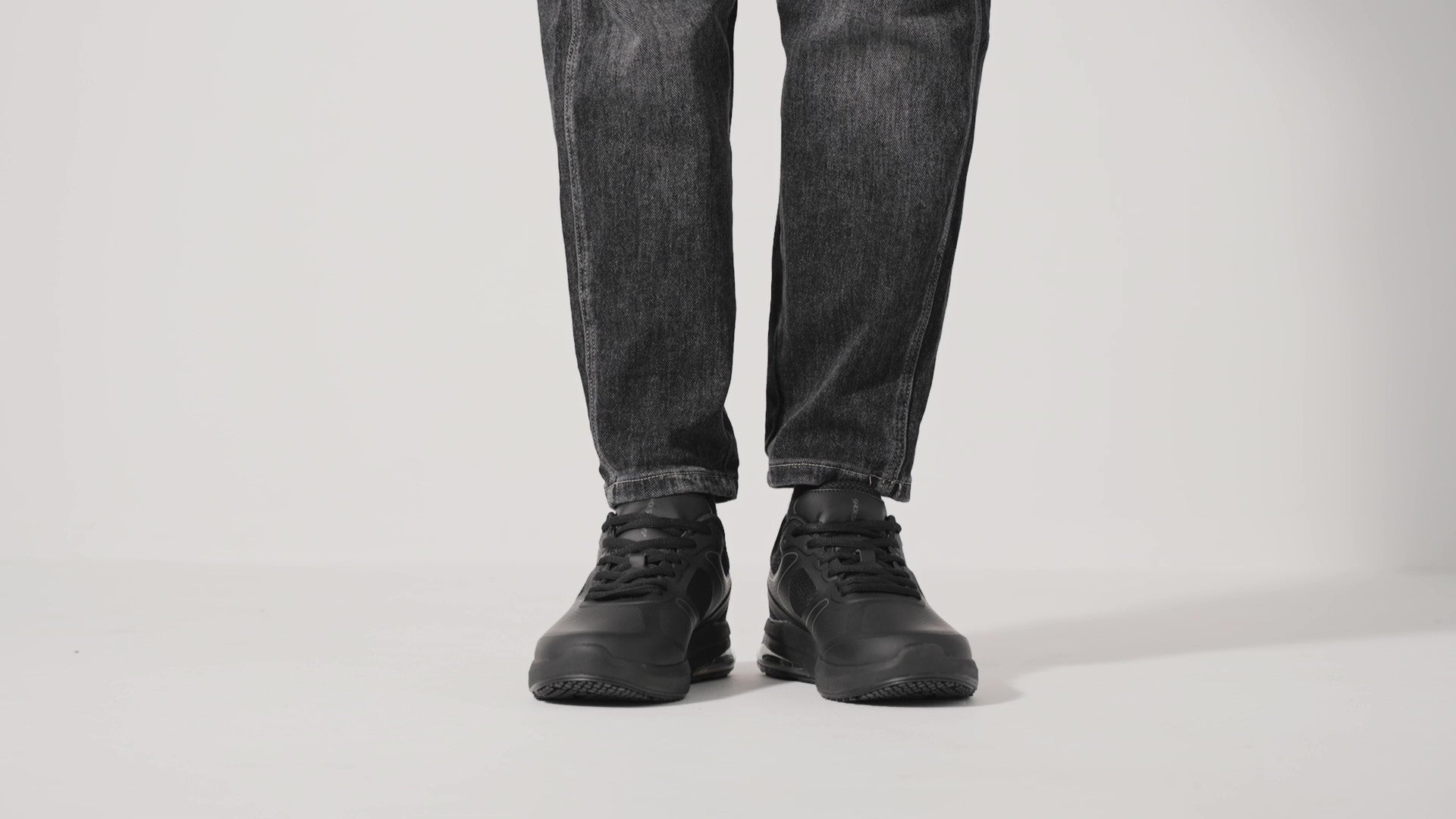 The Revolution II Black from Shoes For Crews are slip-resistant trainers designed to provide comfort, product video.