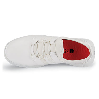 The Karina White by Lila from Shoes For Crews are black slip-resistant trainers that are lightweight and have Flex Tread technology, seen from above.