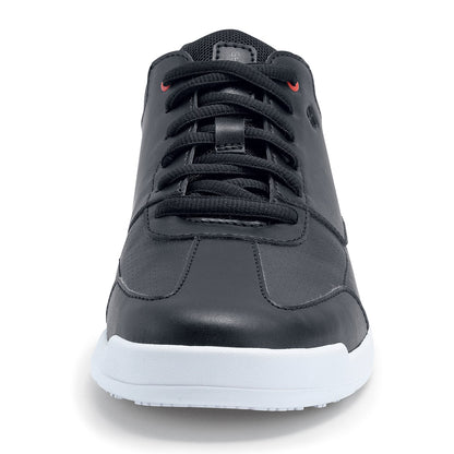 The Liberty White Outsole from Shoes For Crews are slip-resistant trainers with comfortable insoles, seen from the front.