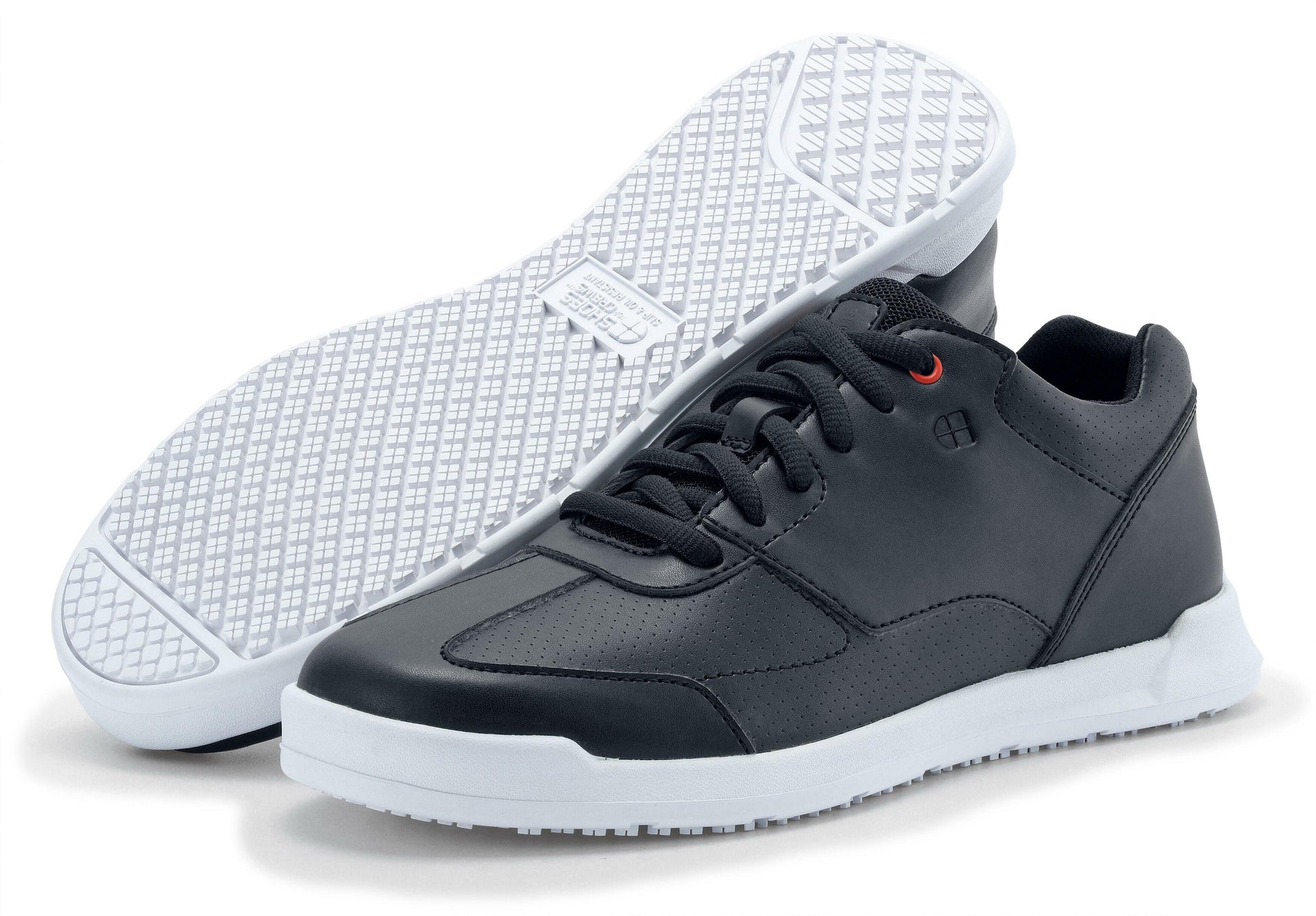 The Liberty White Outsole from Shoes For Crews are slip-resistant trainers with comfortable insoles, pair seen from the left side and the sole.