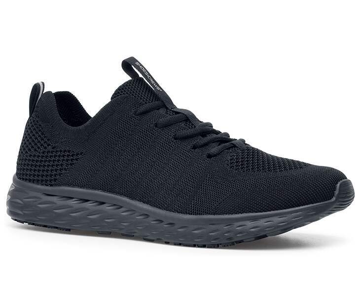 The Everlight Womens Black from Shoes For Crews are slip-resistant trainers made with our patented easy-to-clean sole, lightweight and with a breathable, water-resistant kinitted upper, seen from the right profile.