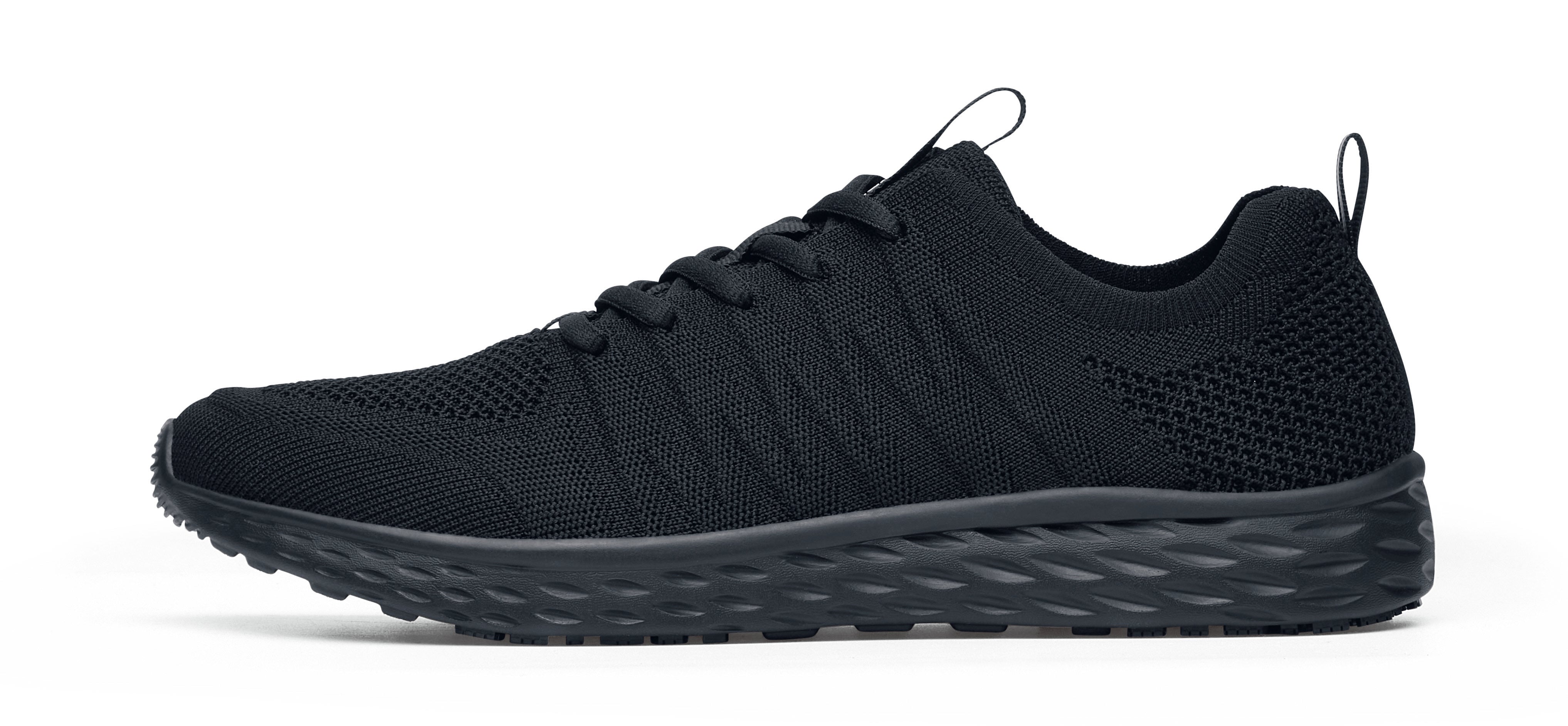 The Everlight Ce Womens Black from Shoes For Crews are slip-resistant trainers with TripGuard technology, removable cushioned insoles and are also breathable, seen from the left.