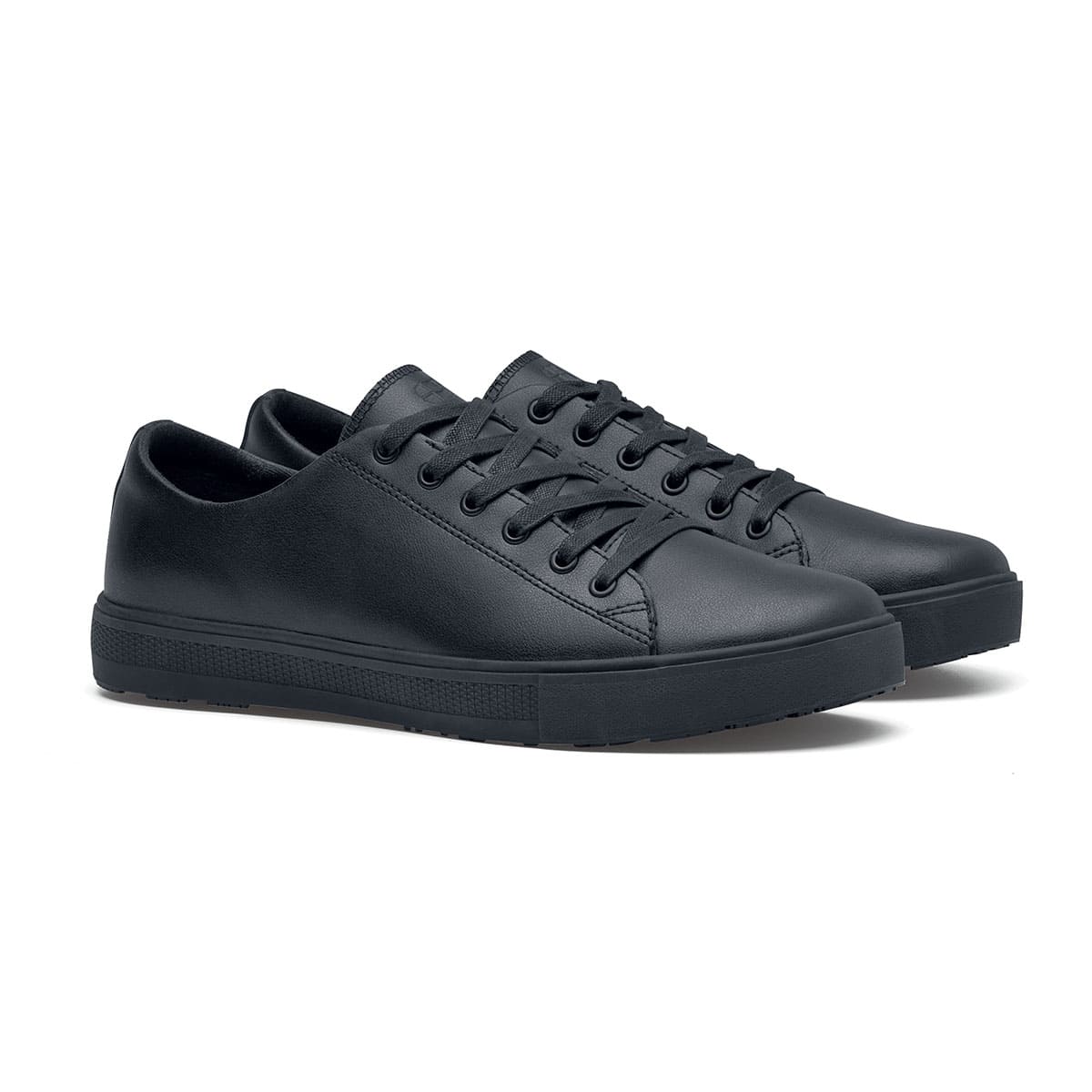 The Old School Low-Rider Black Gladiator Outsole from Shoes For Crews is a slip resistant lace-up shoe designed to provide comfort throughout the day, pair seen in profile on the right.