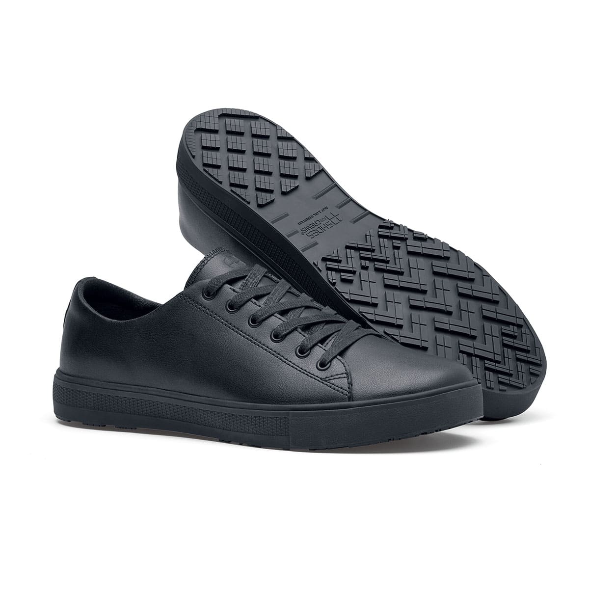 The Old School Low-Rider Black Gladiator Outsole from Shoes For Crews is a slip resistant lace-up shoe designed to provide comfort throughout the day, pair seen from the right side and the sole.